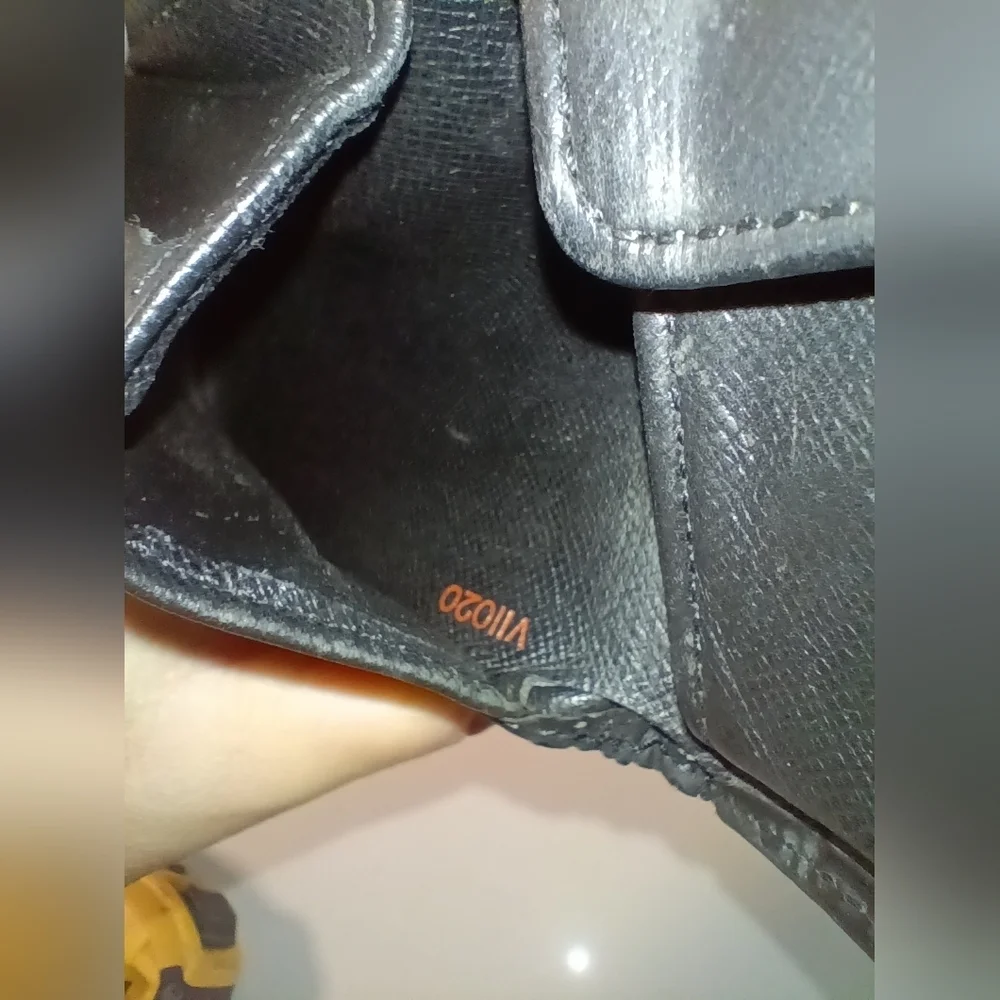 Authentic Louis Vuitton Black Leather Epi Bifold Wallet